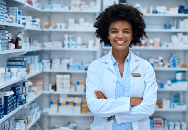 Portrait of a confident young woman working in a pharmacy